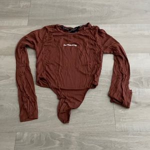 burnt orange alphalete tie front top